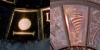 Glowing buttons with the Antarctic stargate origin symbol, a large circle over a horizontal line, and the P7J-989 origin symbol, a series of curved lines tapering to a point, similar to an icon of a tornado or vortex